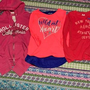 2 shirts and 1 sweatshirt